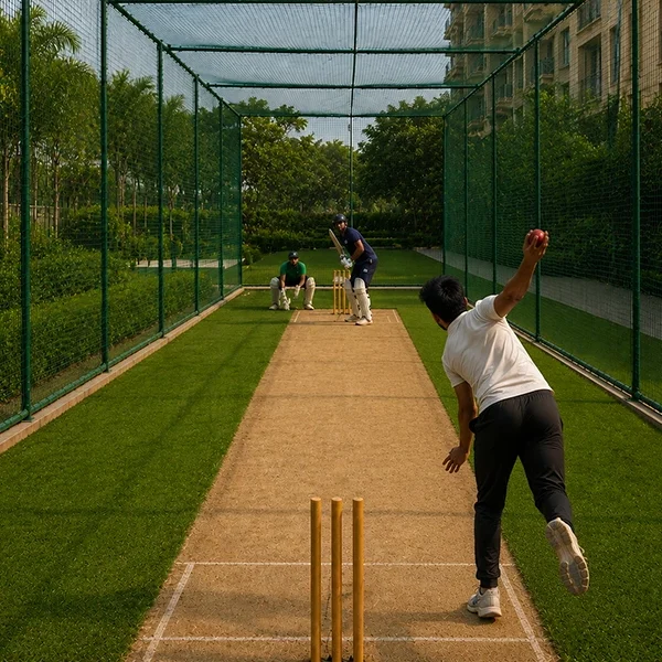 Professional cricket practice pitch at Highland Mayfields with dedicated batting and bowling practice facilities.